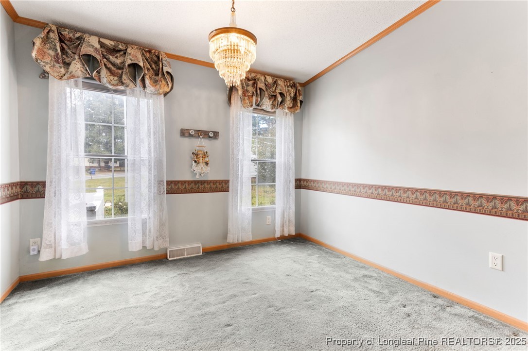 520 Inverary Drive Raeford, NC 28376 - Photo 8 of 43 a view of a livingroom with wooden floor