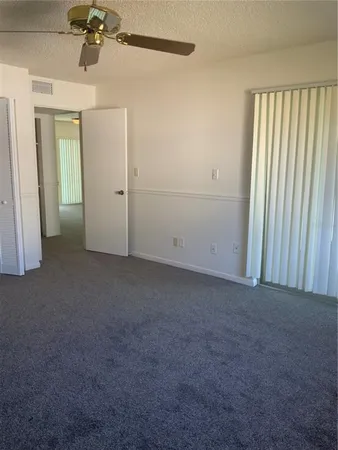 en empty room with a window