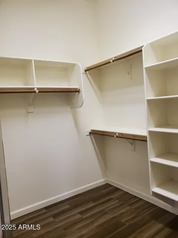 a view of an empty walk in closet