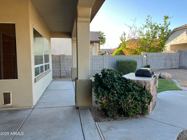a view of a garden with potted plants