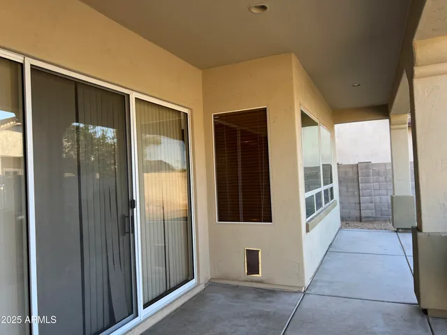 a view of a bathroom with a glass door