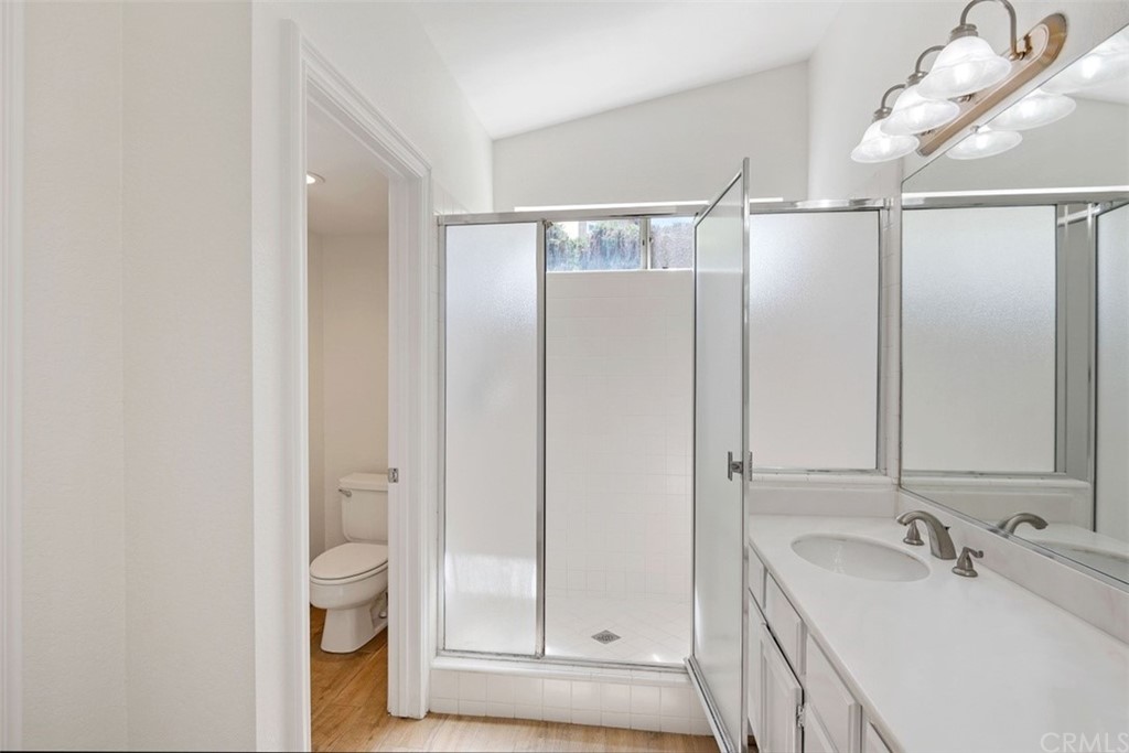 4 Puerto Morant San Clemente, CA 92672 - Photo 14 of 15 a bathroom with a granite countertop sink mirror and toilet