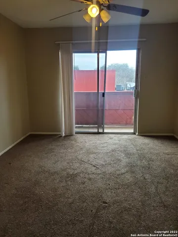 an empty room with window