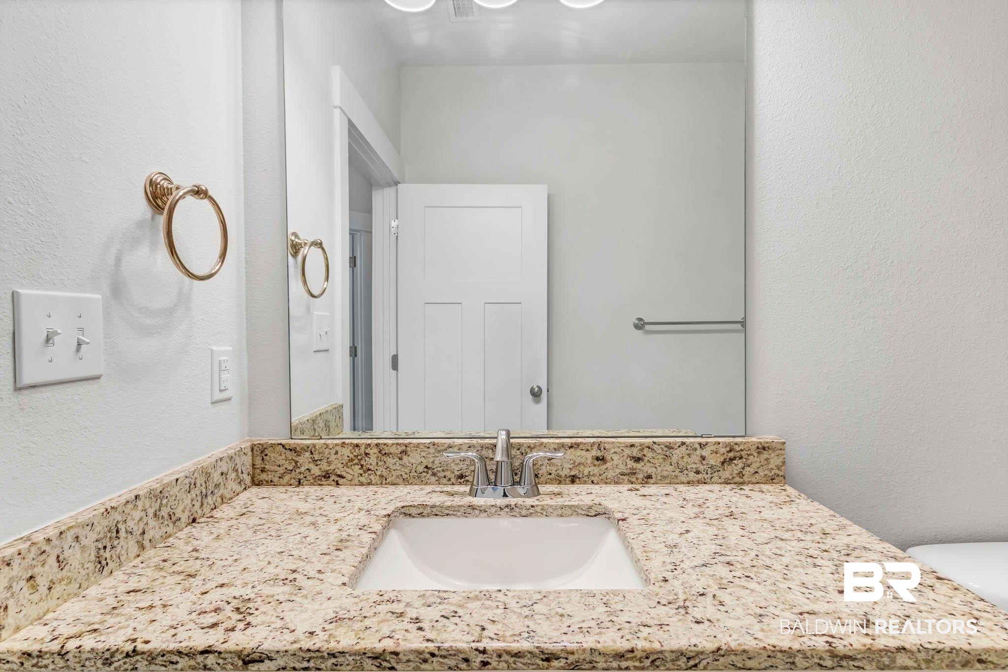 16461 Prado Loop Loxley, AL 36551 - Photo 38 of 78 Bathroom featuring a textured wall and vanity