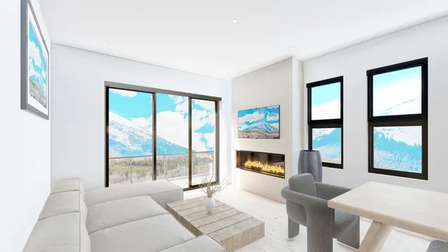 a bedroom with a large bed and a large window