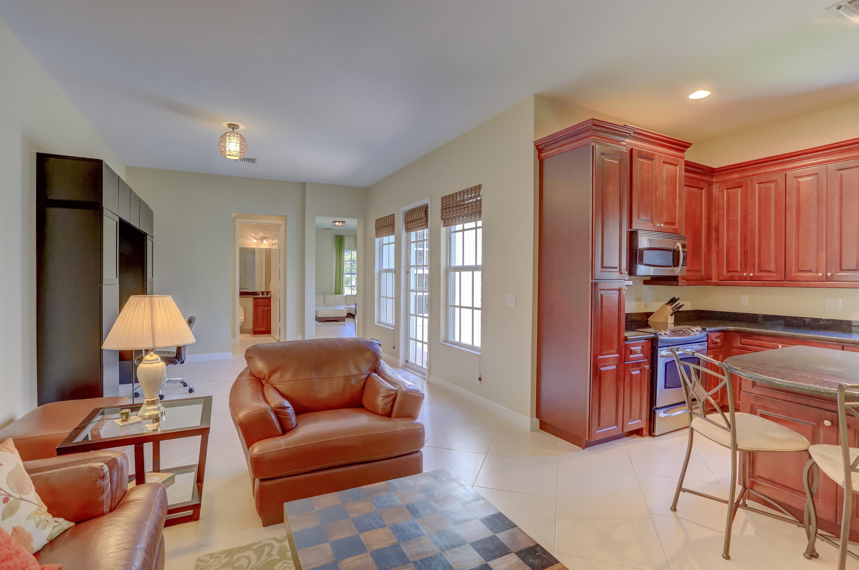 829 Northwest 82nd Place Boca Raton, FL 33487 - Photo 14 of 54 Kitchen & Family Room
