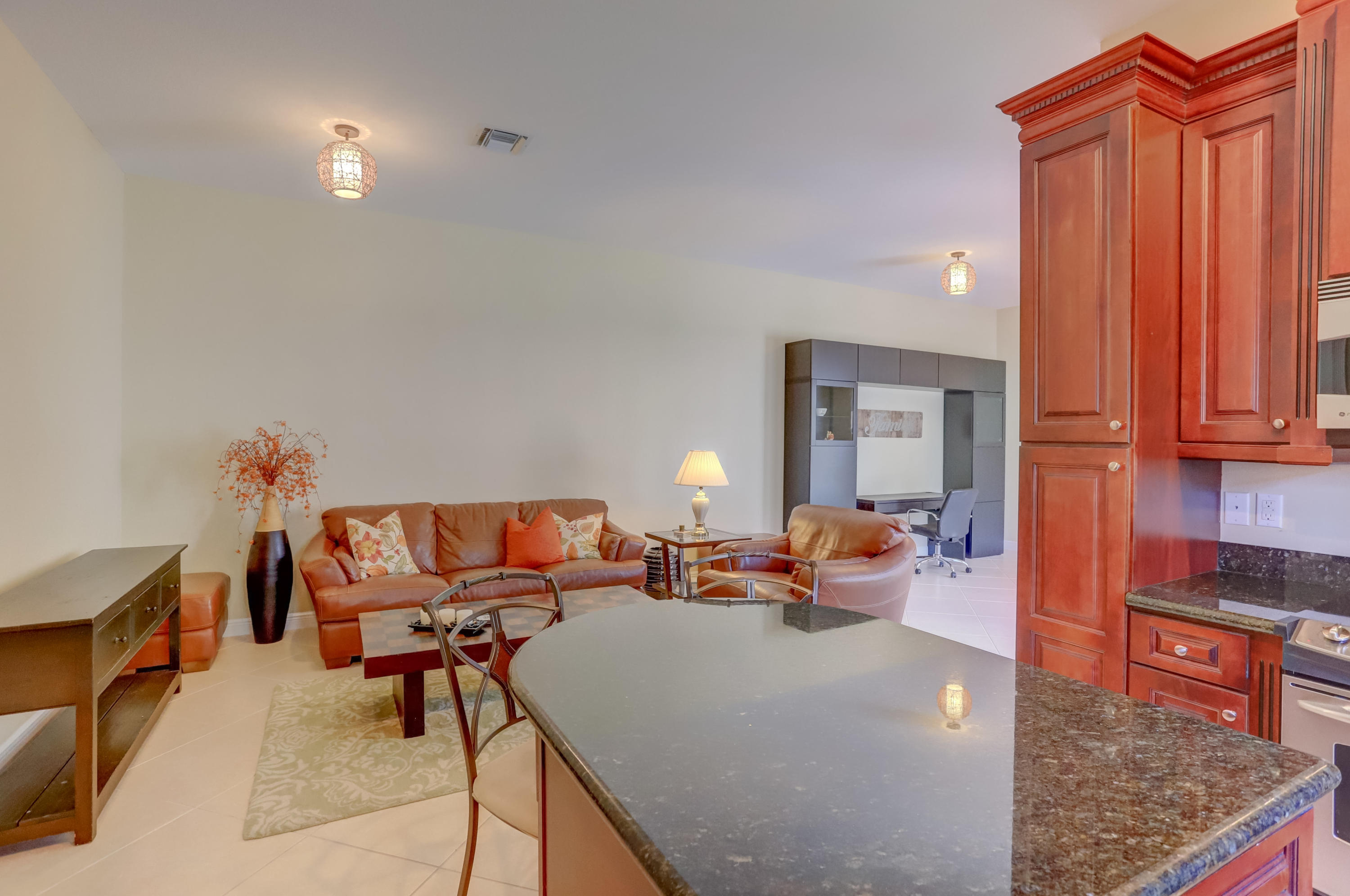 829 Northwest 82nd Place Boca Raton, FL 33487 - Photo 20 of 54 Kitchen & Family Room