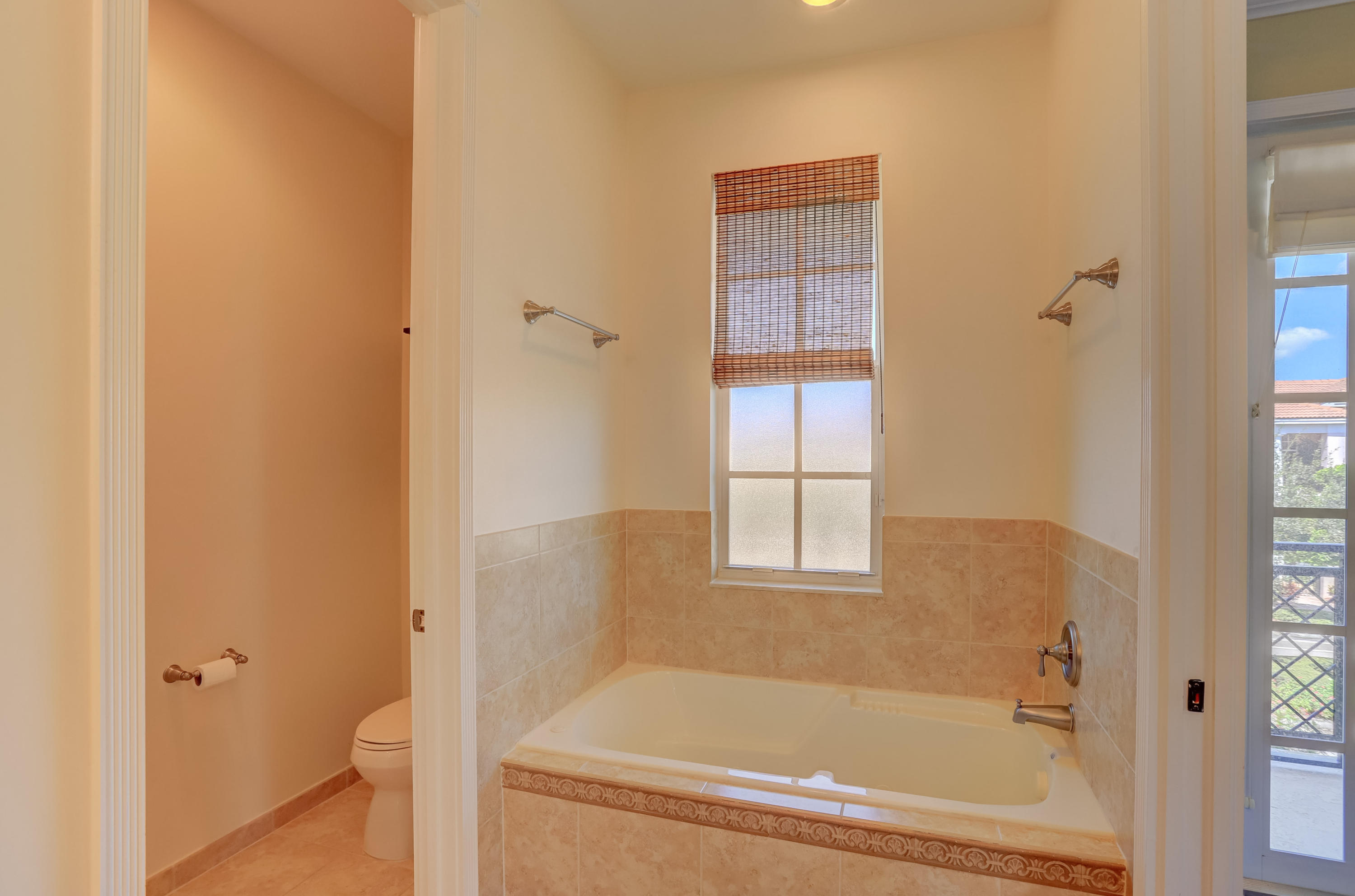 829 Northwest 82nd Place Boca Raton, FL 33487 - Photo 29 of 54 Master Tub & Separate Water Closet