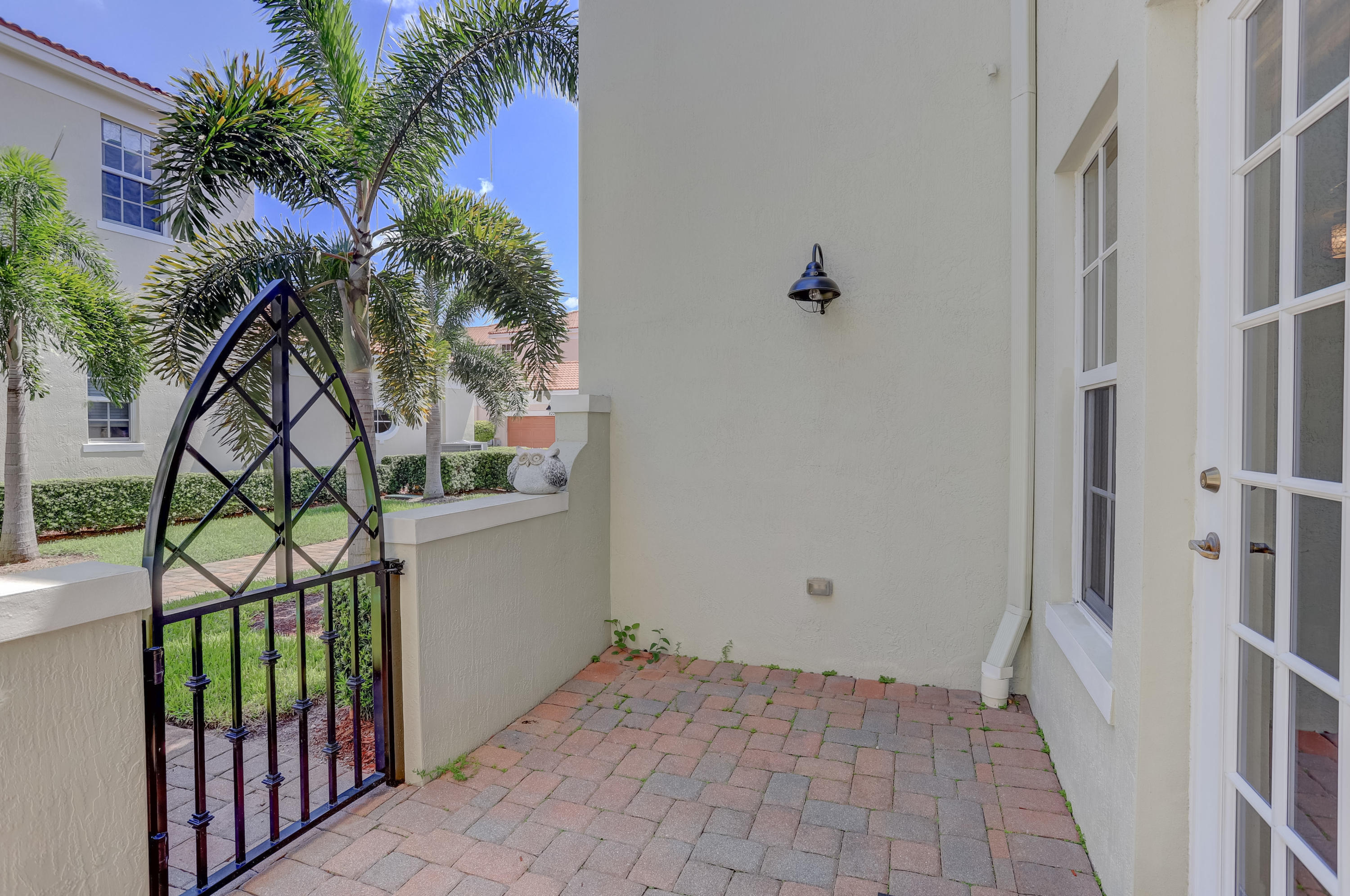829 Northwest 82nd Place Boca Raton, FL 33487 - Photo 45 of 54 Outdoor Side Patio