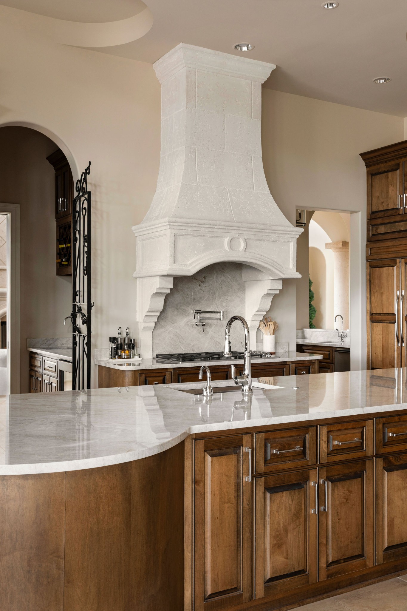 423 Canterbury Rise Franklin, TN 37067 - Photo 17 of 100 a kitchen with stainless steel appliances granite countertop a sink a stove and white cabinets