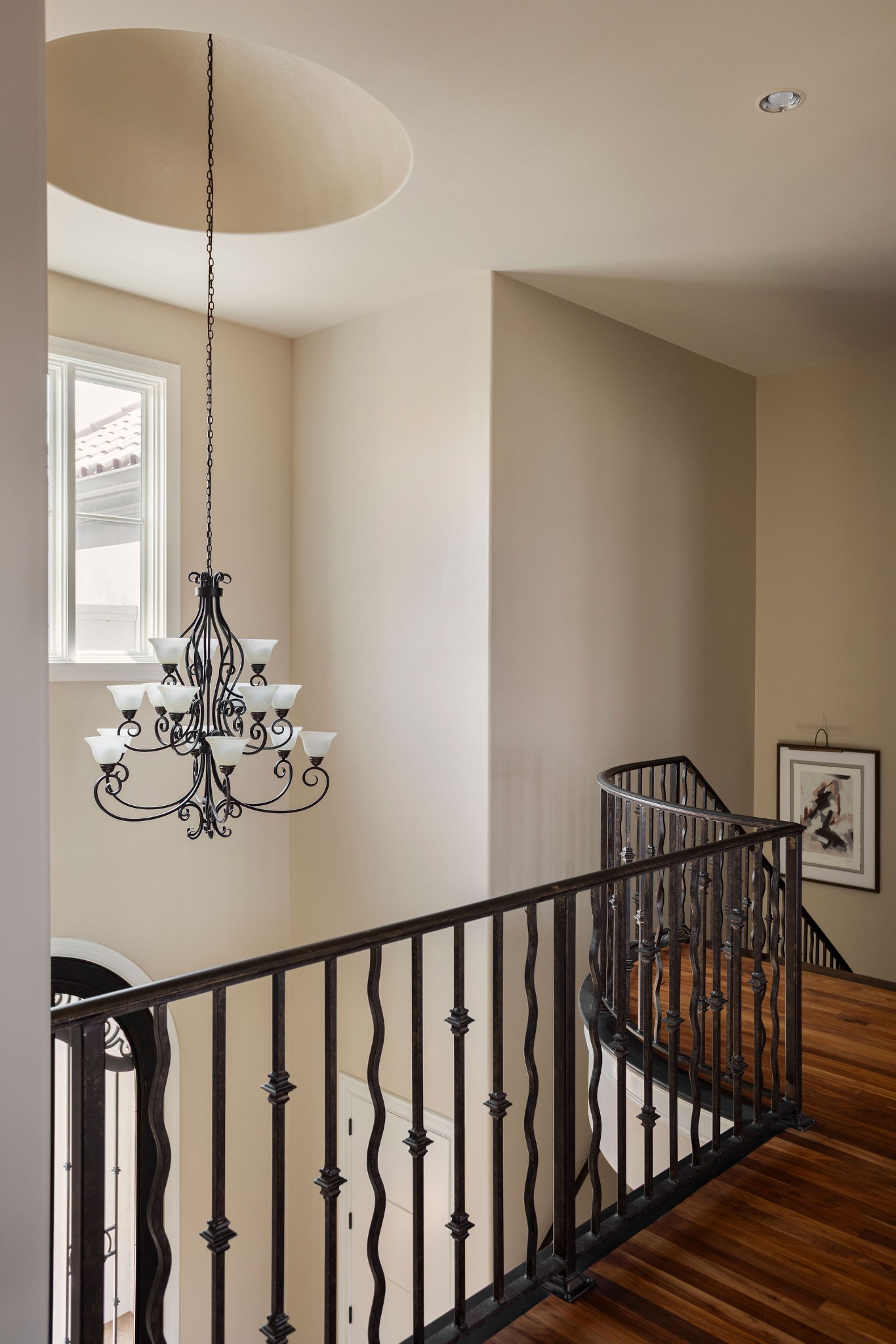 423 Canterbury Rise Franklin, TN 37067 - Photo 49 of 100 a view of hallway with wooden floor and chandelier