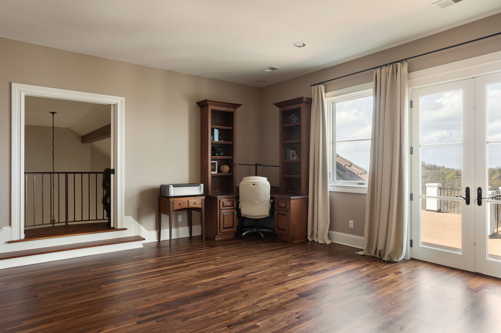 423 Canterbury Rise Franklin, TN 37067 - Photo 56 of 100 a view of a room with wooden floor furniture and windows