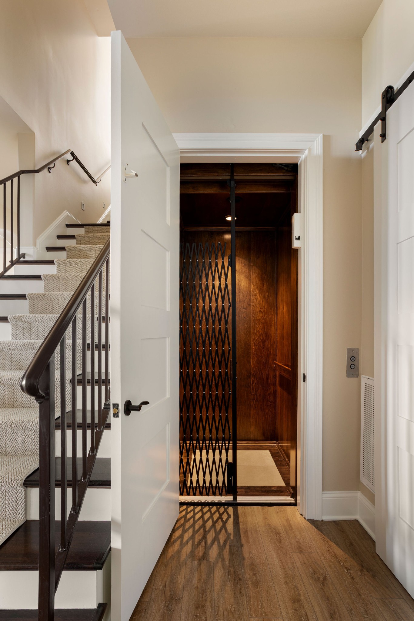 423 Canterbury Rise Franklin, TN 37067 - Photo 61 of 100 a view of a hallway with wooden floor and staircase