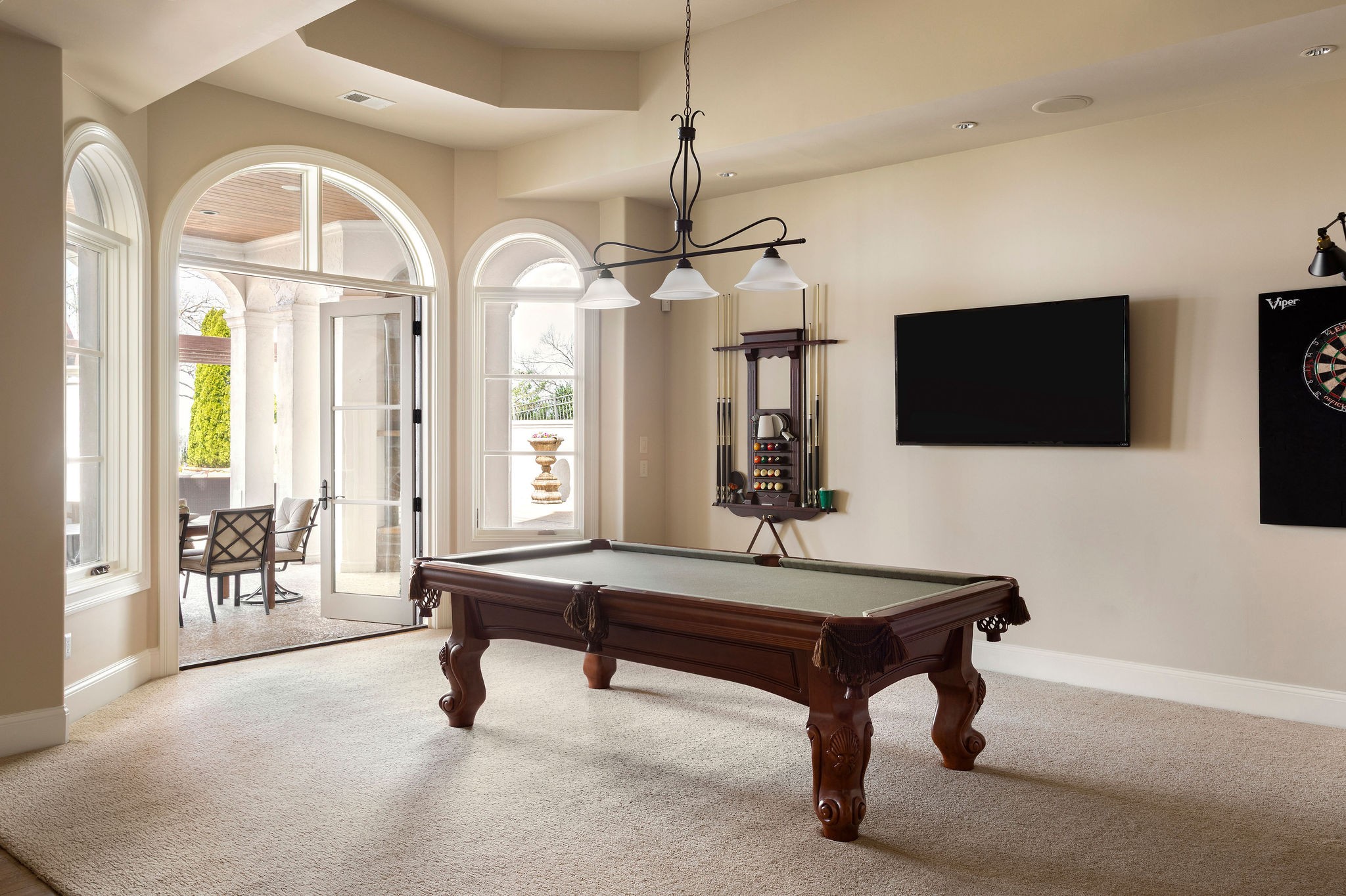 423 Canterbury Rise Franklin, TN 37067 - Photo 66 of 100 a living room with furniture a flat screen tv and a large window