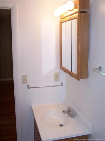 a bathroom with a sink and a bathtub