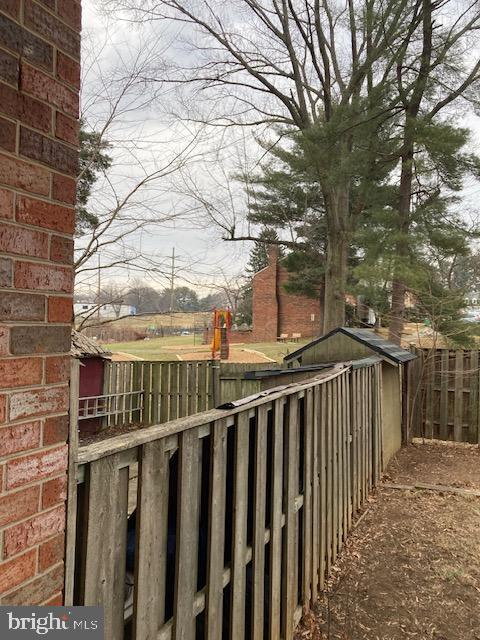 35 Midline Court Gaithersburg, MD 20878 - Photo 10 of 11 Backyard overlooking rec center (pool) and playgrd