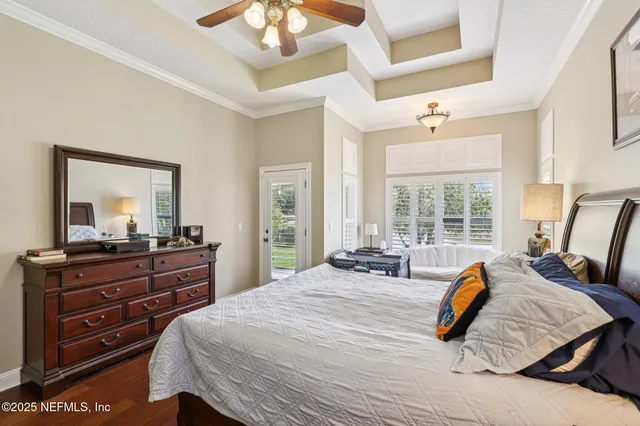 a bathroom with a double vanity sink mirror and shower