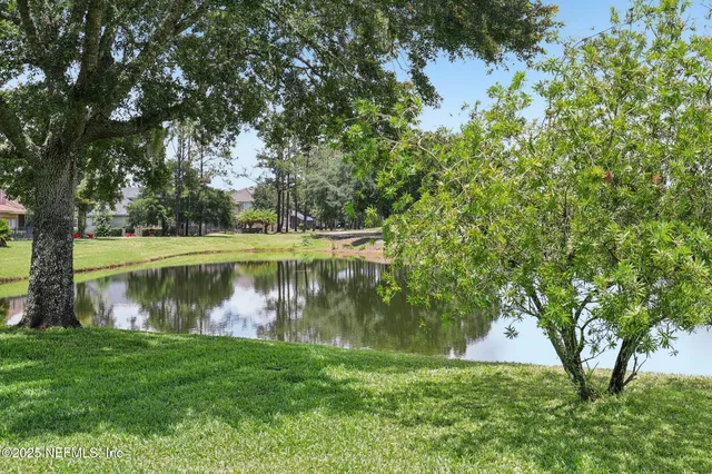 an aerial view of a house with a garden