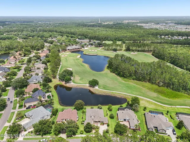 a picture of a bathroom with a shower