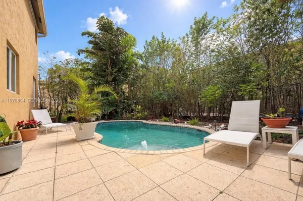 a view of outdoor space yard swimming pool and patio