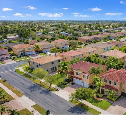 a view of swimming pool with outdoor seating