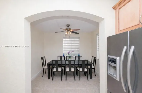 a view of a dining room with furniture