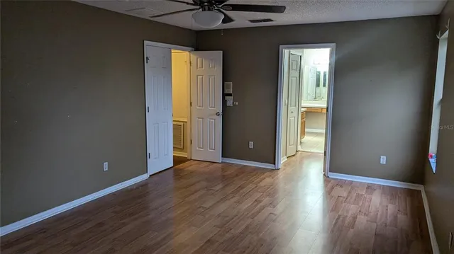 a bathroom with a mirror and a sink