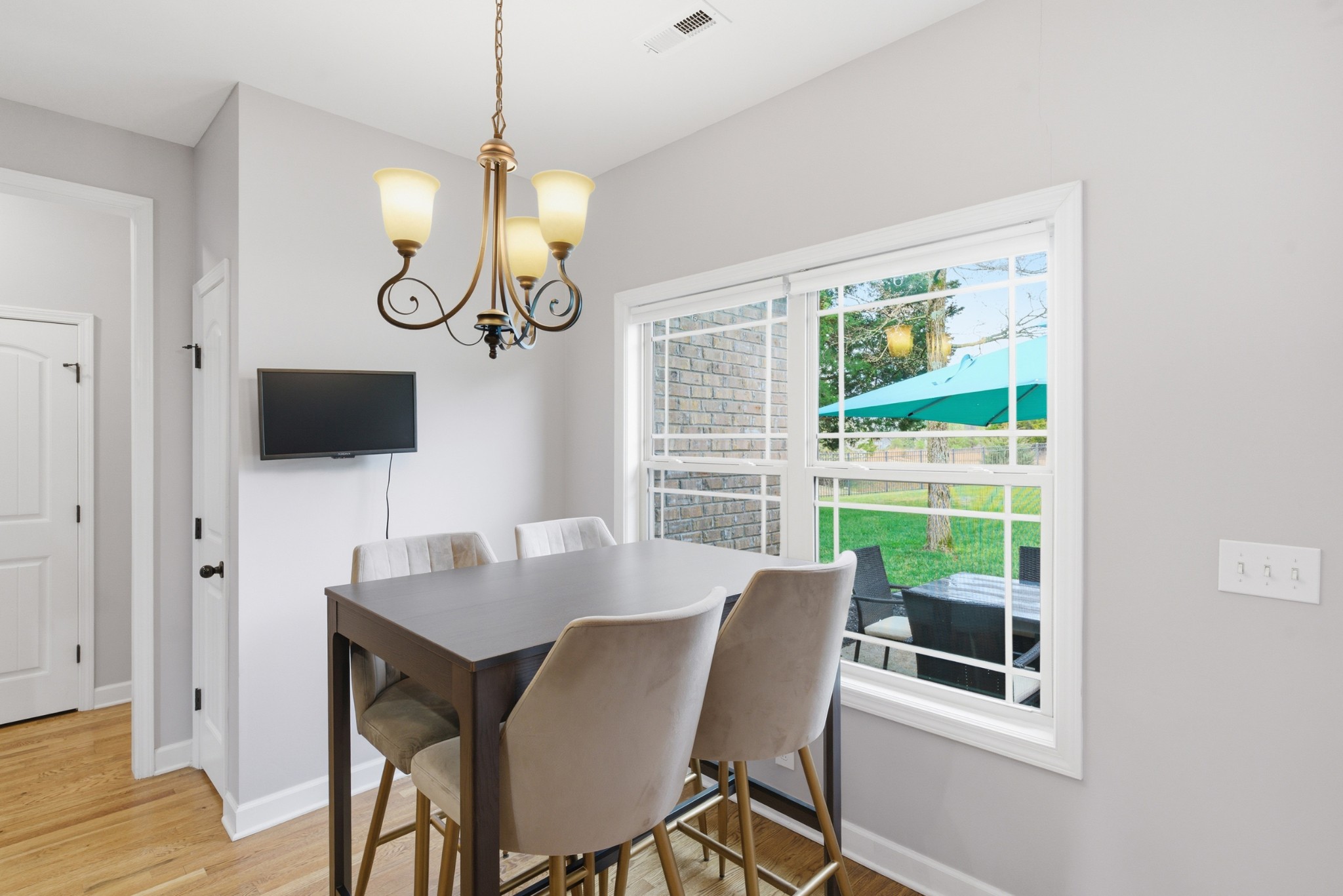 108 Amazonway Ridge Lascassas, TN 37085 - Photo 5 of 31 a view of a dining room with furniture a rug and wooden floor