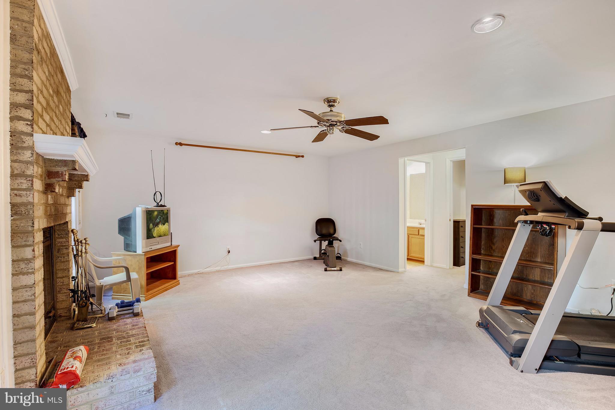 301 Crescendo Way Silver Spring, MD 20901 - Photo 3 of 30 a view of a room with gym equipment