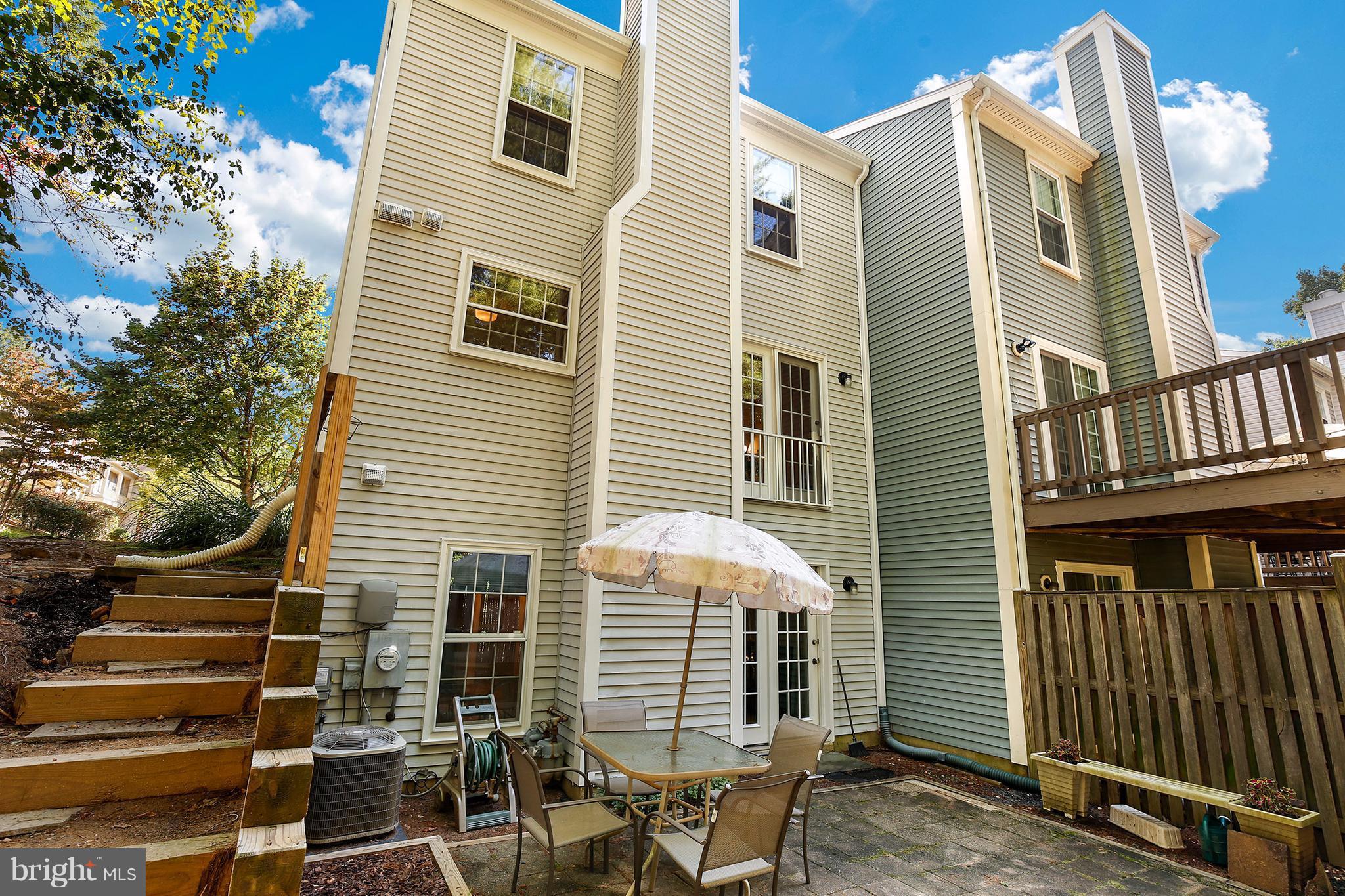 301 Crescendo Way Silver Spring, MD 20901 - Photo 30 of 30 a view of a house with a balcony