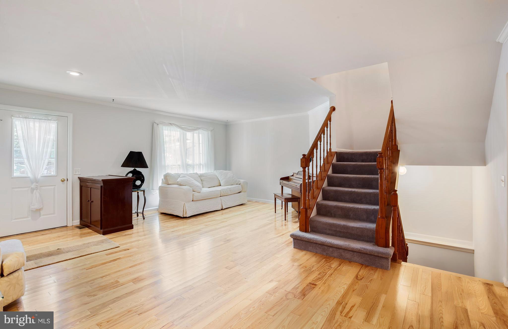 301 Crescendo Way Silver Spring, MD 20901 - Photo 6 of 30 a bedroom with a bed and a large window