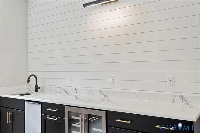 a bathroom with a sink and vanity