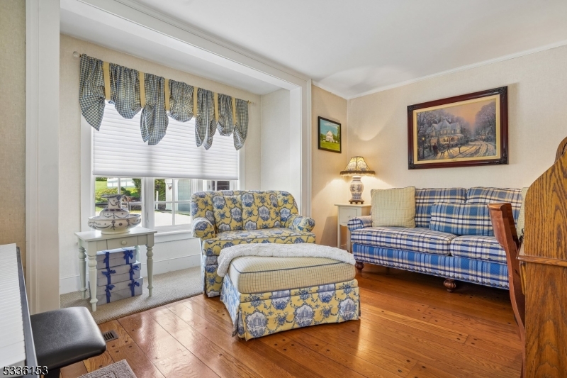 70 Pleasant Run Road Flemington, NJ 08822 - Photo 11 of 50 a bedroom with a bed and a chair