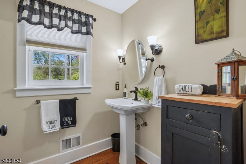 70 Pleasant Run Road Flemington, NJ 08822 - Photo 15 of 50 a bathroom with a sink and a mirror