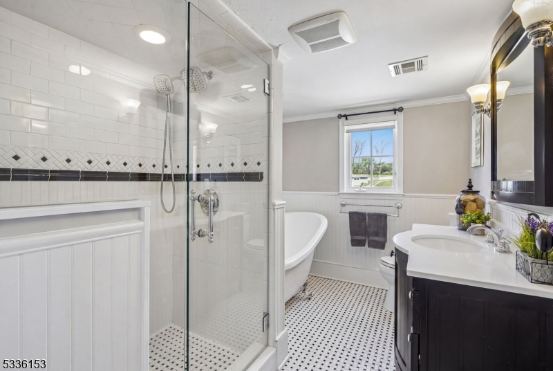 70 Pleasant Run Road Flemington, NJ 08822 - Photo 22 of 50 a bathroom with a double vanity sink a mirror and a shower