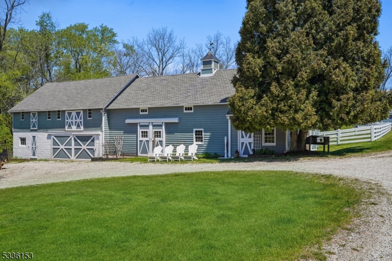 70 Pleasant Run Road Flemington, NJ 08822 - Photo 27 of 50 a front view of a house with a garden and trees