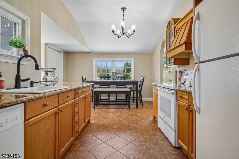 70 Pleasant Run Road Flemington, NJ 08822 - Photo 39 of 50 a kitchen with stainless steel appliances granite countertop a sink and a refrigerator