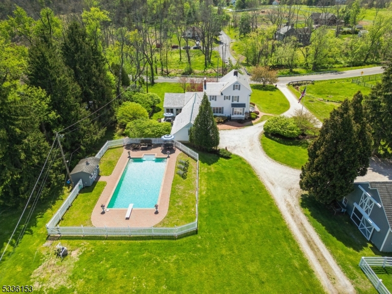 70 Pleasant Run Road Flemington, NJ 08822 - Photo 46 of 50 a view of a swimming pool with a yard and seating area
