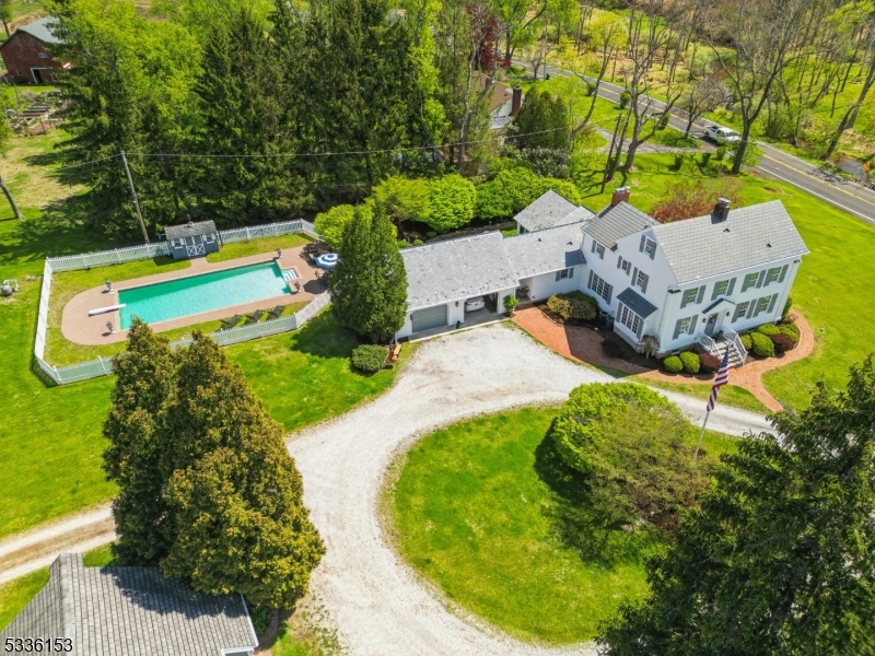 70 Pleasant Run Road Flemington, NJ 08822 - Photo 47 of 50 an aerial view of a house with a garden and swimming pool