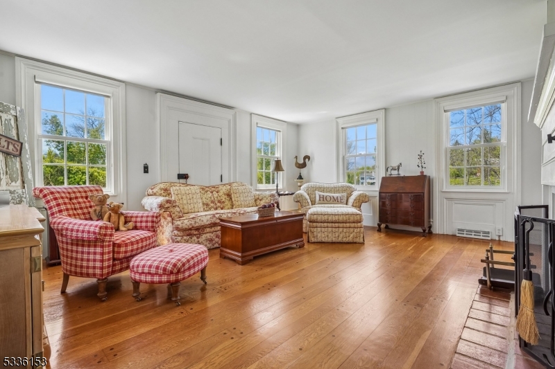 70 Pleasant Run Road Flemington, NJ 08822 - Photo 9 of 50 a living room with furniture and wooden floor