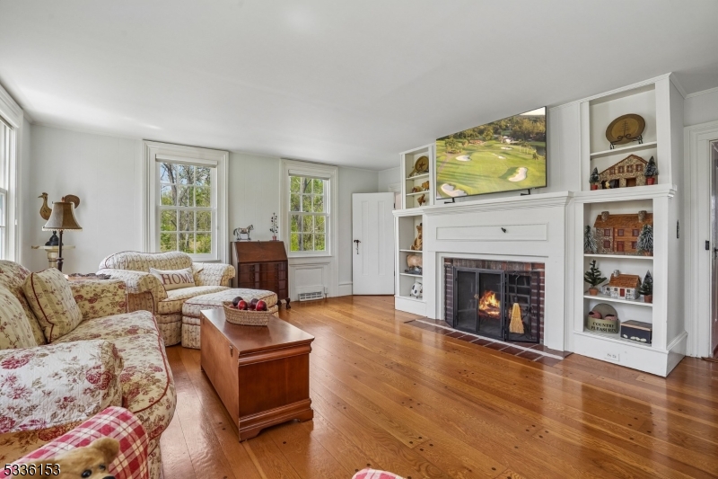 70 Pleasant Run Road Flemington, NJ 08822 - Photo 10 of 50 a living room with furniture and a fireplace