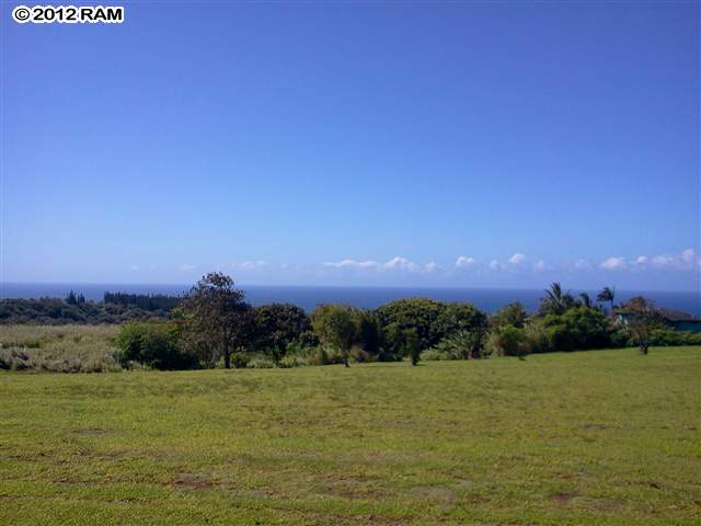 0 North Holokai Road, Unit 4A Haiku, HI 96708 - Photo 3 of 19 a view of a lake and sunset