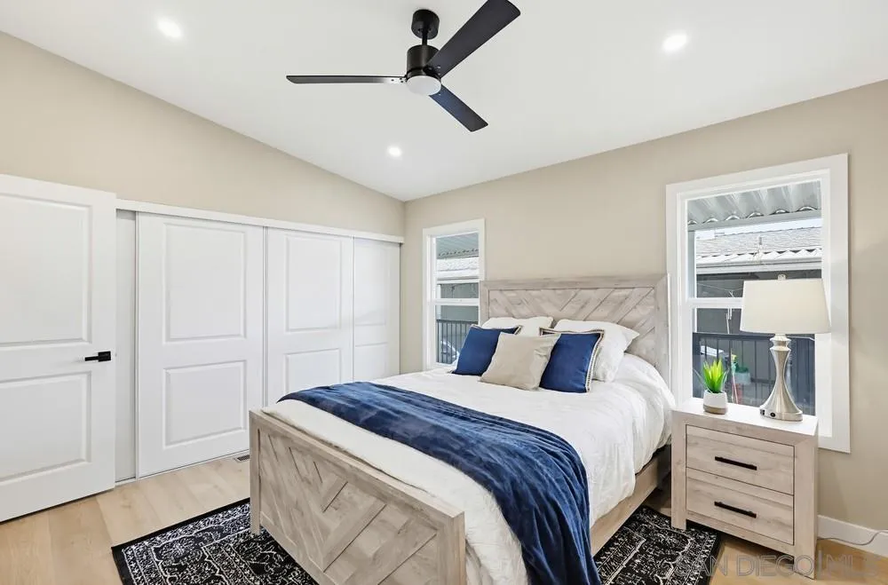 11949 Riverside Drive, Unit 23 Lakeside, CA 92040 - Photo 15 of 27 a bedroom with a bed and cabinets