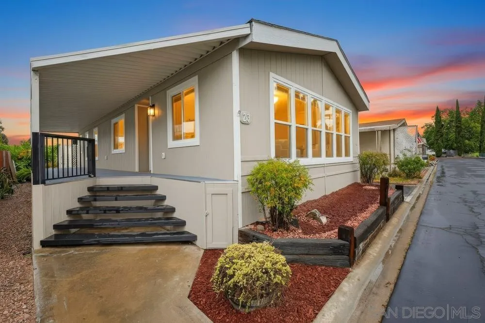 11949 Riverside Drive, Unit 23 Lakeside, CA 92040 - Photo 3 of 27 a view of a house with backyard and sitting area