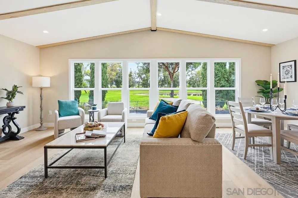 11949 Riverside Drive, Unit 23 Lakeside, CA 92040 - Photo 5 of 27 a living room with furniture and a large window