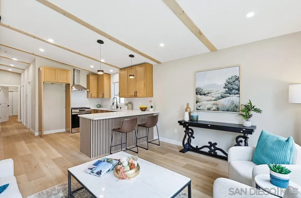 11949 Riverside Drive, Unit 23 Lakeside, CA 92040 - Photo 10 of 27 a living room with dining table and chairs