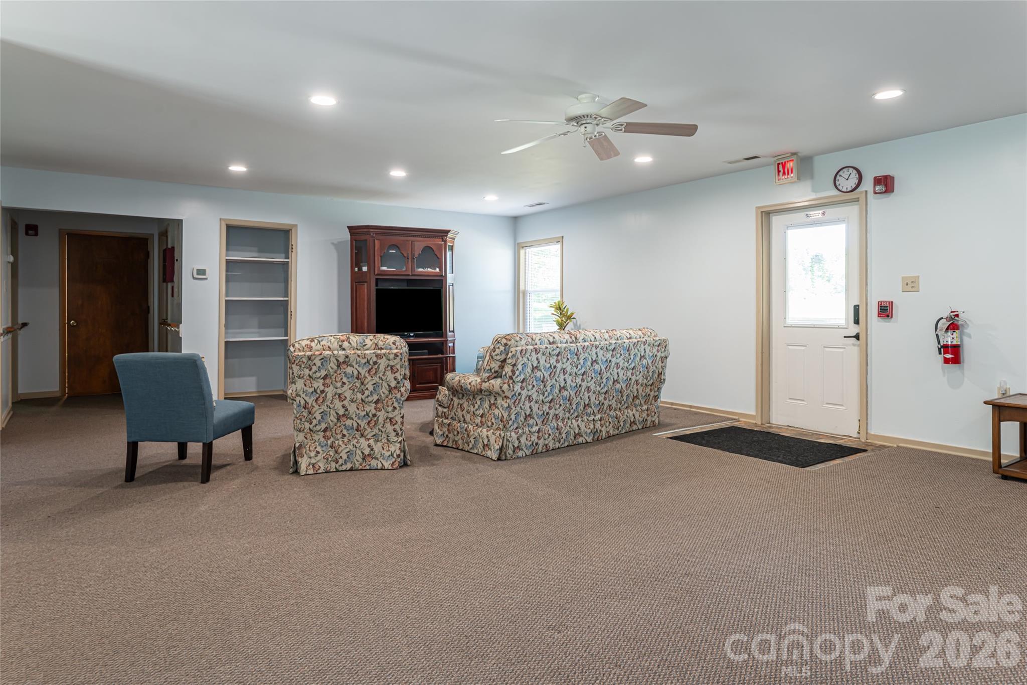 2800 Coxe Road Tryon, NC 28782 - Photo 29 of 40 a living room with furniture and a flat screen tv