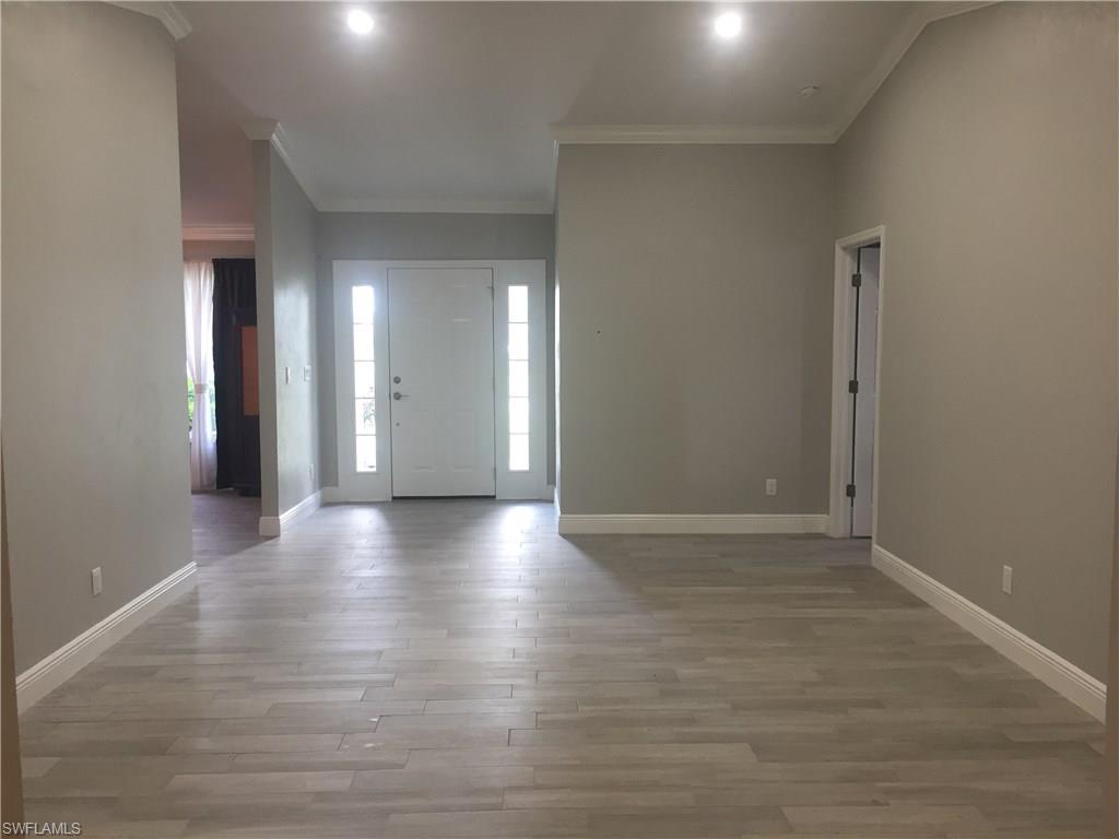 109 Blue Ridge Drive, Unit 22 Naples, FL 34112 - Photo 13 of 23 Formal Living Room area