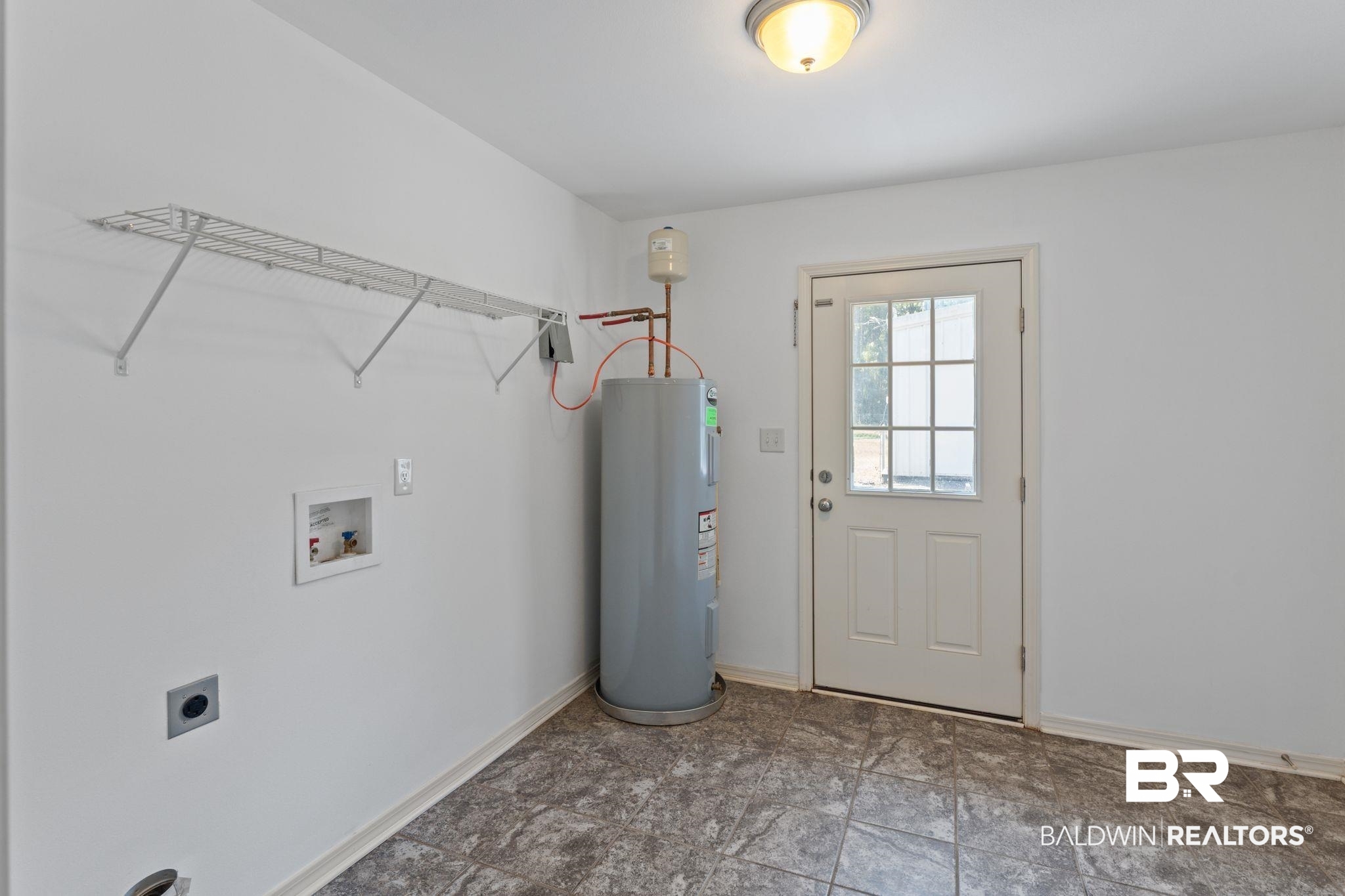 10535 Rhett McConnell Road Theodore, AL 36582 - Photo 17 of 36 Laundry area with hookup for a washing machine, electric water heater, and hookup for an electric dryer