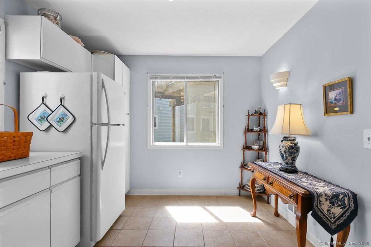 2 Mansfield Grove Road, Unit 262 East Haven, CT 06512 - Photo 18 of 47 Many people have changed the footprint on the kitchen with a built in desk, more cabinets etc. Some even removed the wall deviding the kitchen and the hallway altogether.